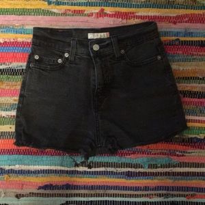 Black/acid wash high waisted Levi shorts